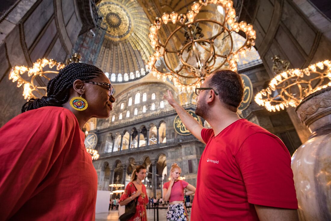 Intrepid leader points out details in the Hagia Sophia interior in Istanbul, Turkey