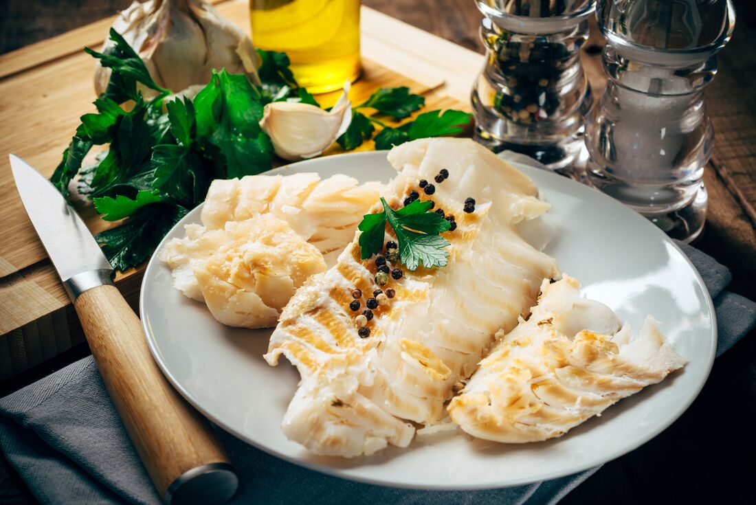 A traditional dish of cod fillet in Lofoten archipelago
