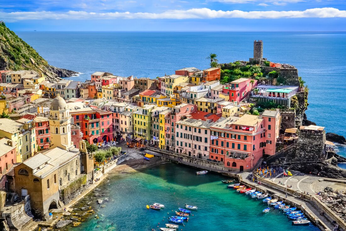 View of the colourful buildings and stunning water of Vernazza Harbour in Cinque Terre, Italy