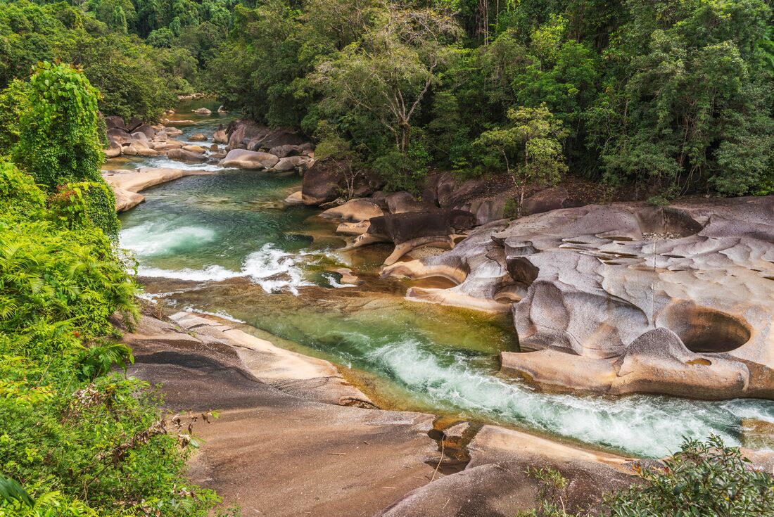 Babinda Boulders creek with many small pools of water formed from the stone along the river in northern Queensland