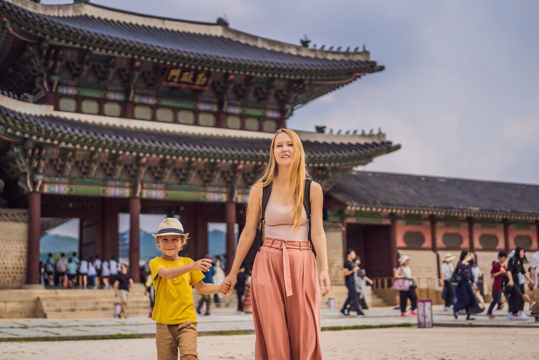 Mother and son touring Gyeongbokgung Palace in Seoul