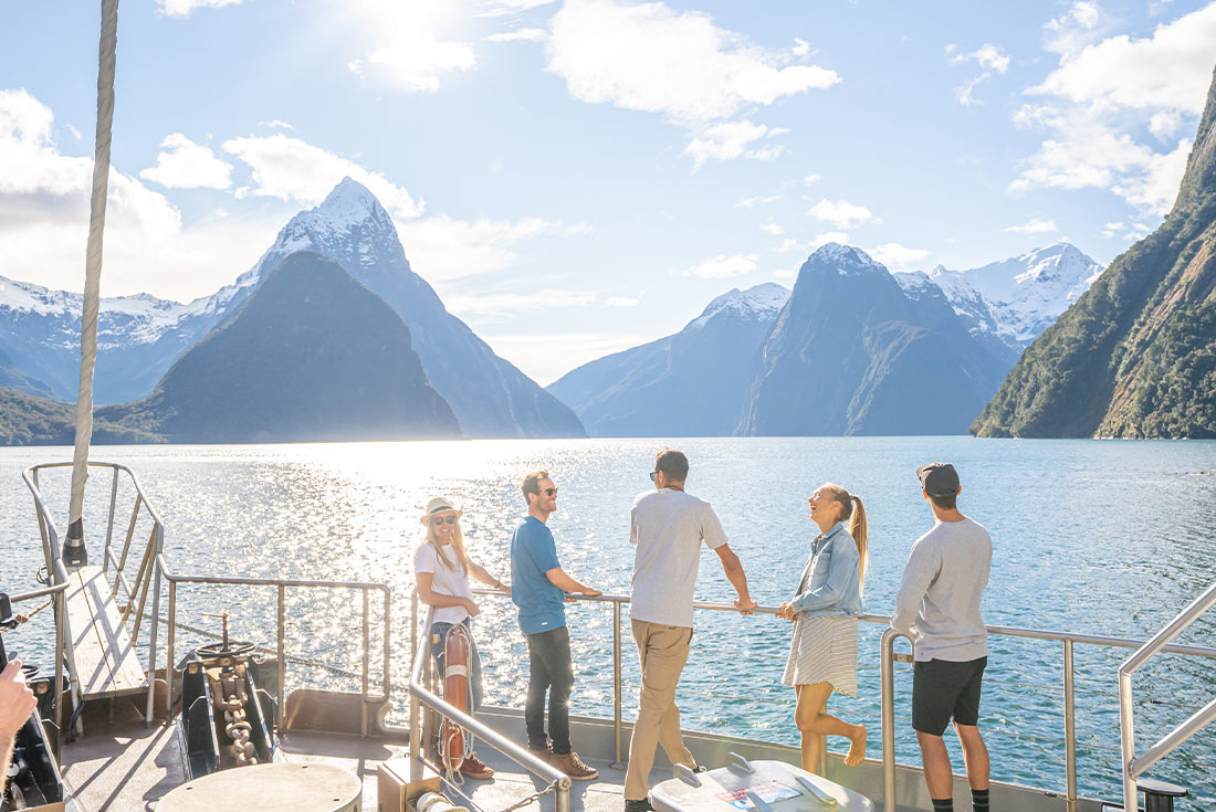 Pax enjoying scenery on Milford Sound overnight Cruise, South Island, NZ