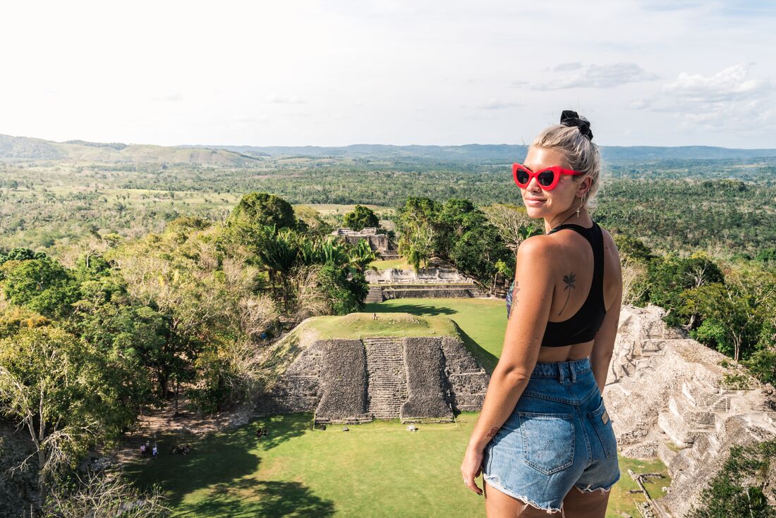 Traveller and ruins in San Ignacio, Belize