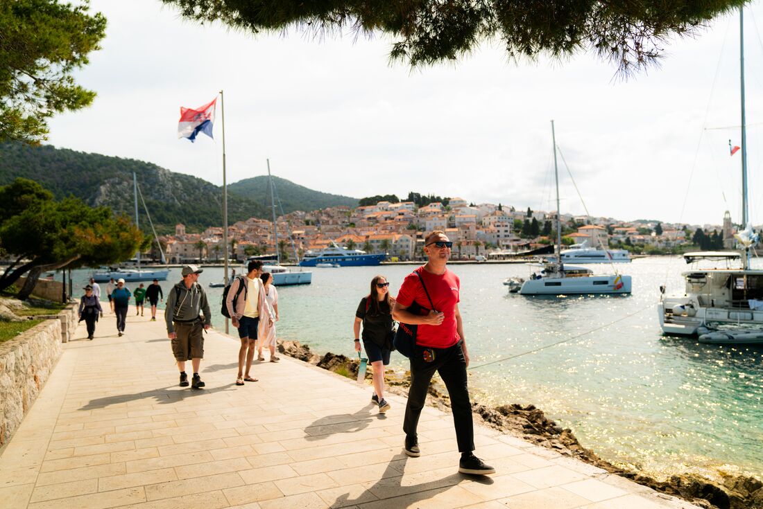 Intrepid leader heads group touring Hvar's coast off Croatia's south coast