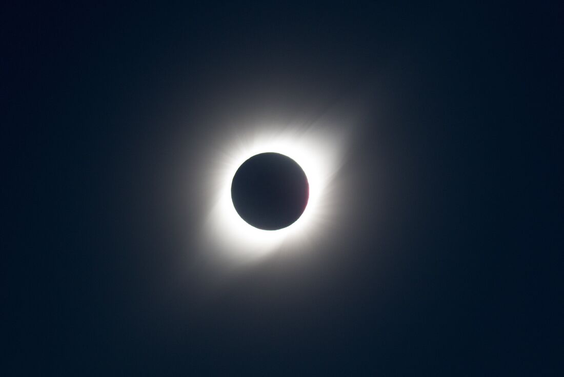 Total solar eclipse over the sky of Greenland's Arctic Circle
