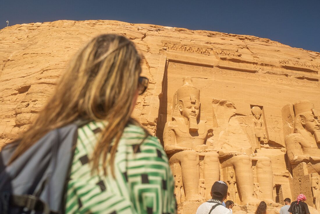 POV from traveller looking up at carved structures at Abu Simbel Tempel in Aswan, Egypt