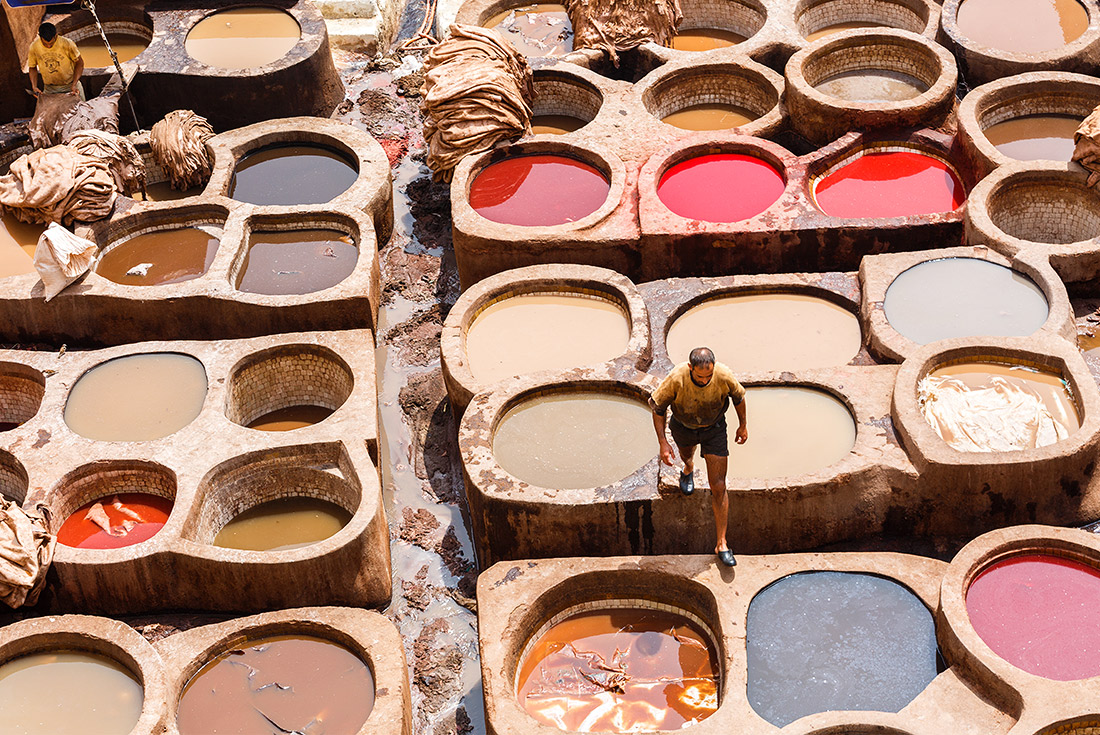 Close up view of local man at leather tanneries, Fes, Morocco