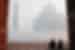 HHPG - Couple sitting in front of the Taj Mahal in the fog