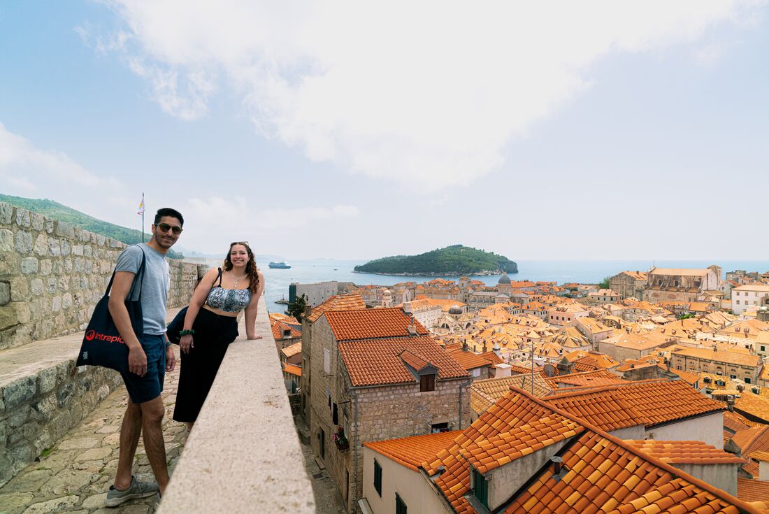 Intrepid travellers enjoy the view from Dubrovnik's city walls in Croatia